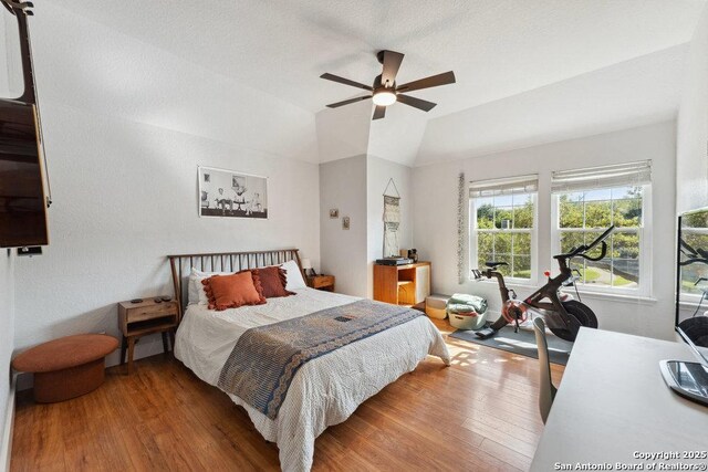 2047 Thicket Trail Dr, San Antonio, TX 78248 - bedroom with ceiling fan, vaulted ceiling, and wood finished floors