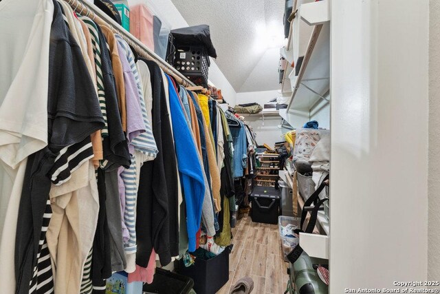 2047 Thicket Trail Dr, San Antonio, TX 78248 - walk in closet with wood finished floors