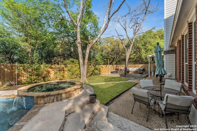 2047 Thicket Trail Dr, San Antonio, TX 78248 - view of yard with a patio, an in ground hot tub, a fenced backyard, and outdoor dining area