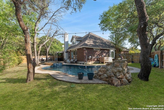 2047 Thicket Trail Dr, San Antonio, TX 78248 - view of swimming pool featuring a yard, a pool with connected hot tub, a fenced backyard, and a patio