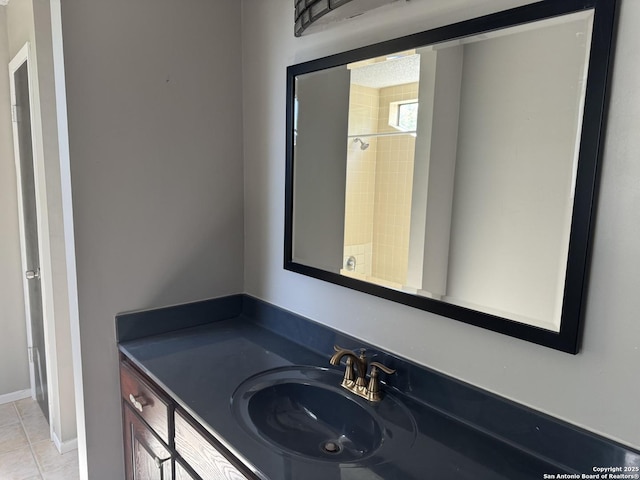 bathroom with vanity and tile patterned flooring