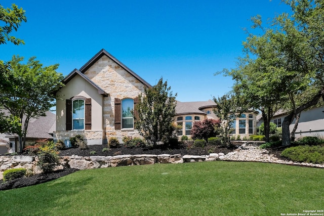 4111 Monteverde Run, San Antonio, TX 78261 - french country inspired facade featuring a front yard and stone siding