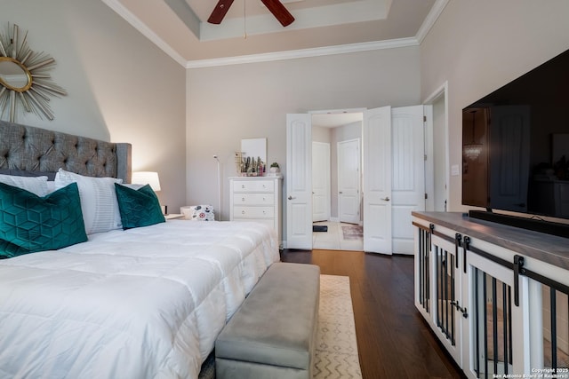 4111 Monteverde Run, San Antonio, TX 78261 - bedroom featuring ornamental molding, a tray ceiling, ceiling fan, and dark wood finished floors