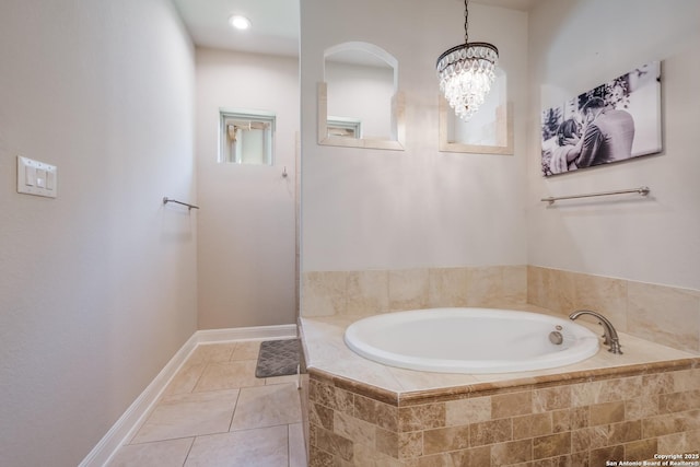 4111 Monteverde Run, San Antonio, TX 78261 - full bath featuring a notable chandelier, tile patterned flooring, baseboards, and a garden tub
