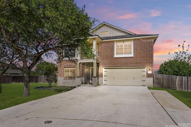 2441 Ibis, New Braunfels, TX 78130 - traditional-style home with driveway, an attached garage, brick siding, a yard, and fence