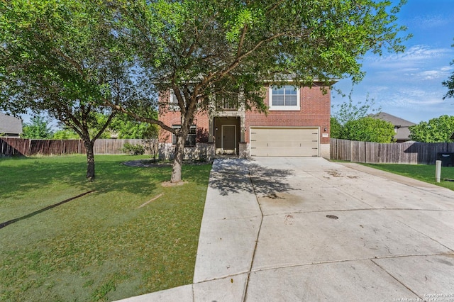 2441 Ibis, New Braunfels, TX 78130 - view of front facade featuring a garage, a front yard, concrete driveway, and brick siding
