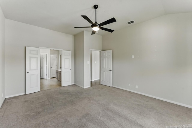 2441 Ibis, New Braunfels, TX 78130 - unfurnished bedroom featuring ceiling fan, high vaulted ceiling, light colored carpet, visible vents, and baseboards