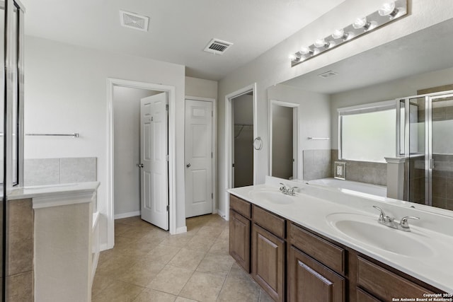 2441 Ibis, New Braunfels, TX 78130 - bathroom with a sink, visible vents, and a garden tub