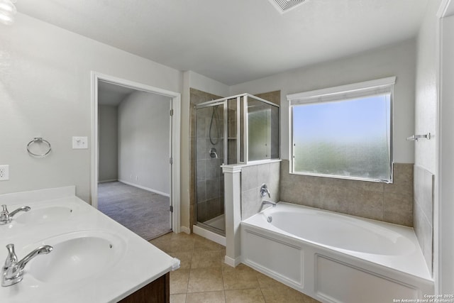 2441 Ibis, New Braunfels, TX 78130 - bathroom with a stall shower, a sink, and tile patterned flooring
