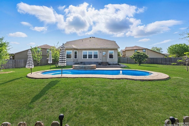 2441 Ibis, New Braunfels, TX 78130 - view of pool with a yard, a fenced backyard, and a pool with connected hot tub