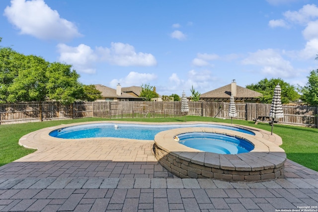 2441 Ibis, New Braunfels, TX 78130 - view of pool featuring a patio area, a fenced backyard, an in ground hot tub, and a lawn