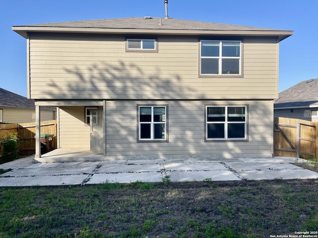 8131 Falcon Mdw, Converse, TX 78109 - back of house with a patio, a yard, and fence