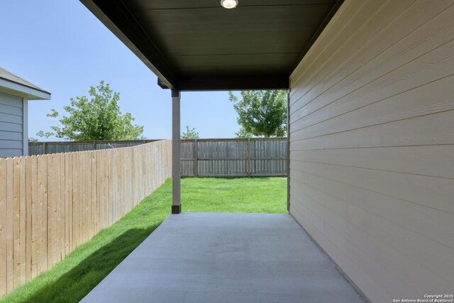 13742 Birch Xing, San Antonio, TX 78252 - fenced backyard with a patio area