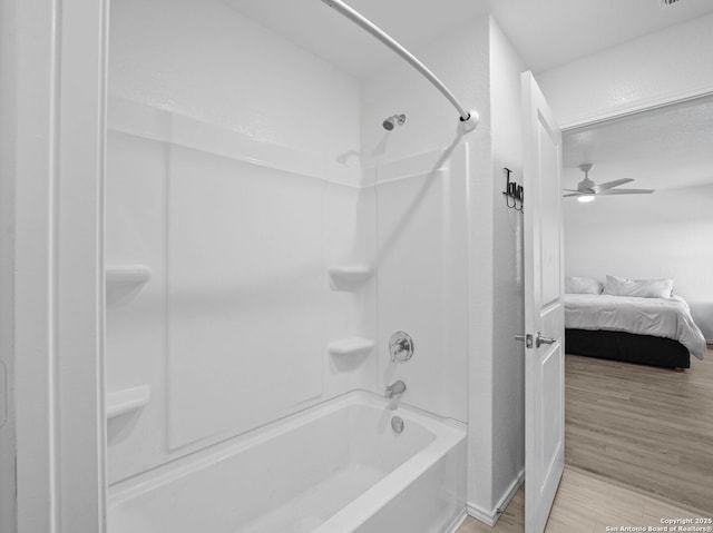 603 Vermilion, San Antonio, TX 78221 - ensuite bathroom featuring a ceiling fan, connected bathroom, shower / bath combination, and wood finished floors