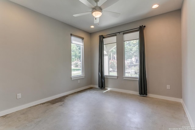 432 E Olmos, San Antonio, TX 78212 - unfurnished room with finished concrete flooring, a ceiling fan, plenty of natural light, and recessed lighting