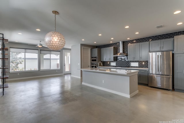 432 E Olmos, San Antonio, TX 78212 - kitchen with baseboards, wall chimney exhaust hood, recessed lighting, finished concrete flooring, and high end refrigerator