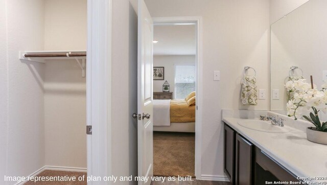 1147 Andean Emerald, San Antonio, TX 78253 - bathroom with vanity, baseboards, and ensuite bathroom