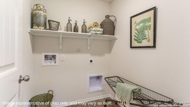 1147 Andean Emerald, San Antonio, TX 78253 - washroom featuring laundry area, hookup for a washing machine, electric dryer hookup, wood finished floors, and hookup for a gas dryer