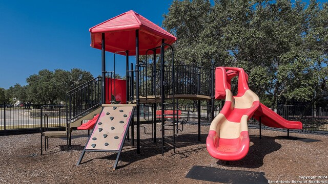1147 Andean Emerald, San Antonio, TX 78253 - community jungle gym with fence