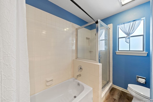 5359 Fredericksburg Rd Unit 808, San Antonio, TX 78229 - full bath with toilet, a washtub, baseboards, an enclosed shower, and wood finished floors