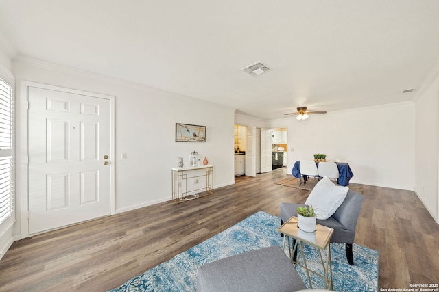 5359 Fredericksburg Rd Unit 808, San Antonio, TX 78229 - living area with a ceiling fan, wood finished floors, and ornamental molding