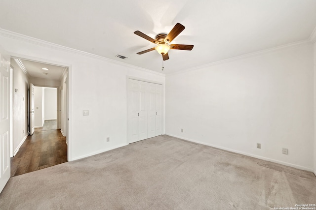 5359 Fredericksburg Rd Unit 808, San Antonio, TX 78229 - unfurnished bedroom with baseboards, visible vents, carpet, and crown molding