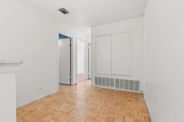 5454 Vista Ct, San Antonio, TX 78247 - unfurnished room with visible vents, baseboards, and a textured ceiling