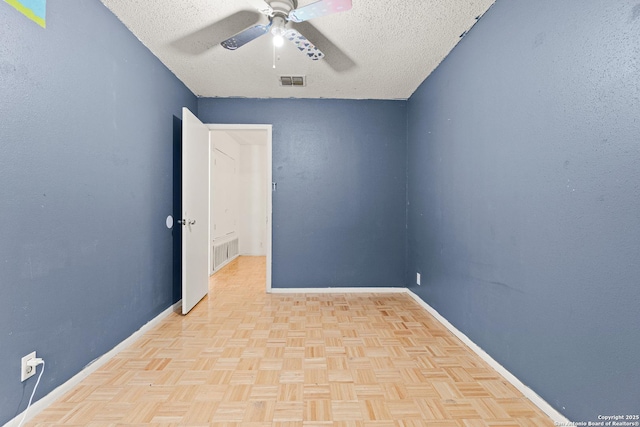5454 Vista Ct, San Antonio, TX 78247 - empty room with visible vents, baseboards, a ceiling fan, and a textured ceiling