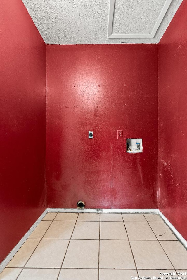 5454 Vista Ct, San Antonio, TX 78247 - clothes washing area featuring electric dryer hookup, laundry area, hookup for a washing machine, and light tile patterned flooring