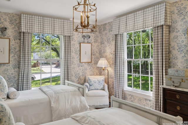 643 Terrell Rd, Terrell Hills, TX 78209 - living area with a chandelier, ornamental molding, and wallpapered walls