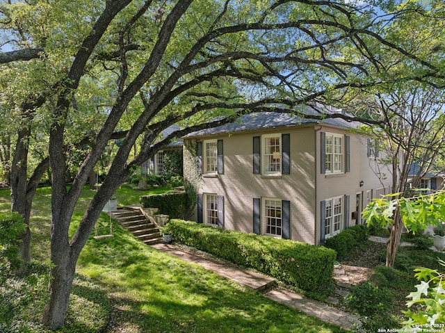 643 Terrell Rd, Terrell Hills, TX 78209 - view of side of home with a yard