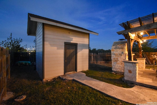 1318 Sunbend, San Antonio, TX 78224 - view of shed with a fenced backyard and a pergola