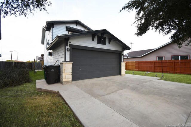 1318 Sunbend, San Antonio, TX 78224 - view of property exterior with a garage, fence, and a lawn