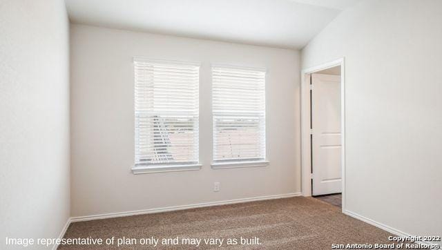 5111 Wichita Pike, San Antonio, TX 78253 - empty room with plenty of natural light, carpet, and baseboards