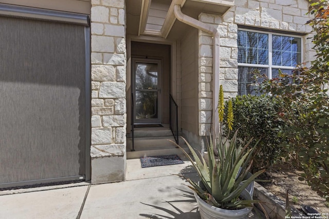 8018 Radiant Sunset, San Antonio, TX 78252 - doorway to property with stone siding