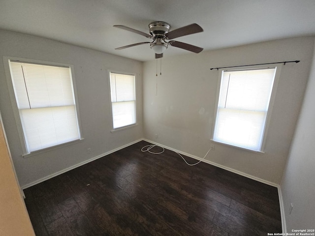 390 Harcourt, San Antonio, TX 78223 - unfurnished room featuring ceiling fan, wood finished floors, and baseboards