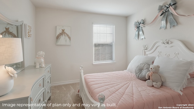 bedroom with light colored carpet and baseboards