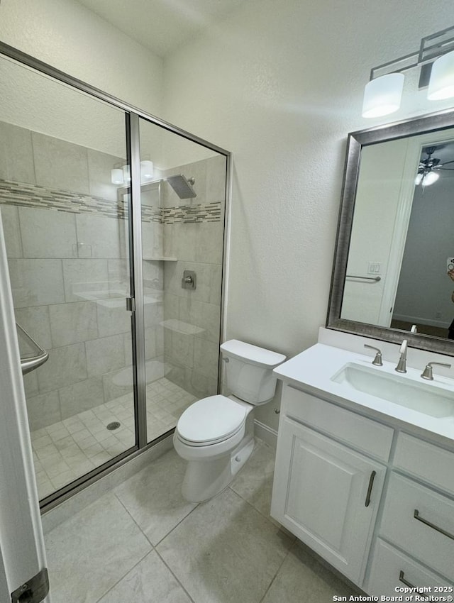 8118 Vanity, San Antonio, TX 78256 - full bath featuring tile patterned floors, toilet, a shower stall, and vanity