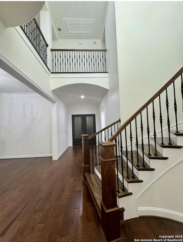 8118 Vanity, San Antonio, TX 78256 - interior space with arched walkways, wood finished floors, a high ceiling, and baseboards