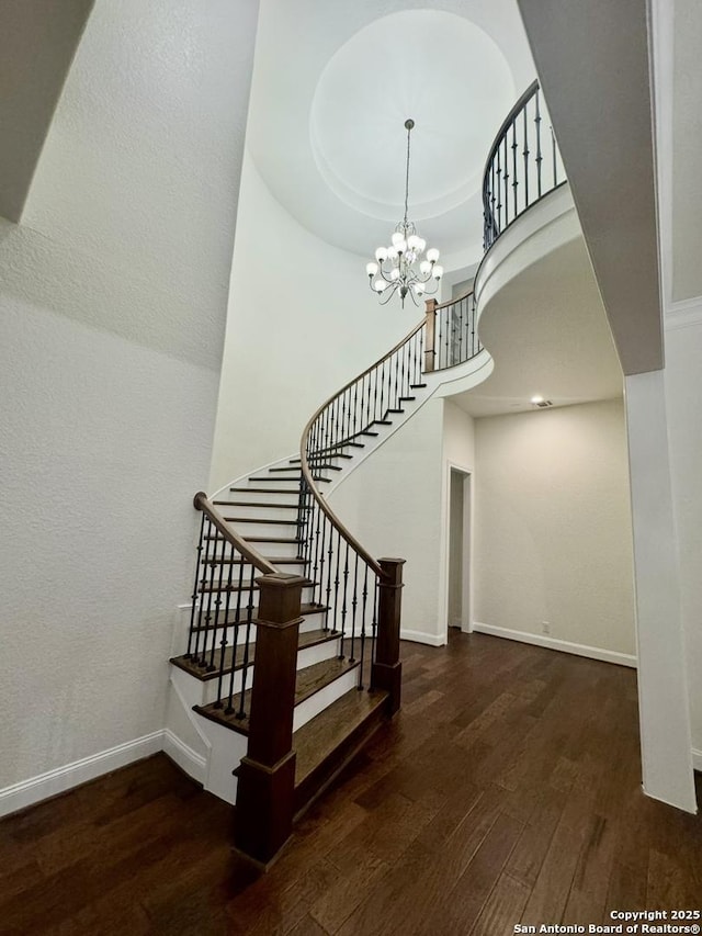 8118 Vanity, San Antonio, TX 78256 - stairs with baseboards, an inviting chandelier, and wood finished floors