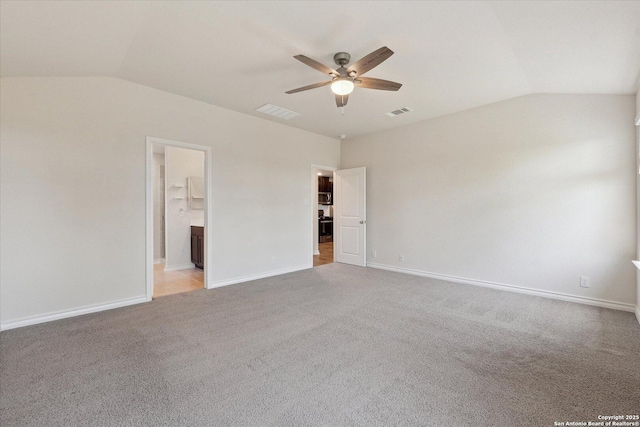 13506 Whisper Bnd, San Antonio, TX 78252 - unfurnished bedroom featuring light carpet, visible vents, baseboards, and vaulted ceiling