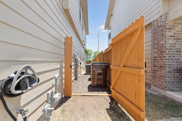 13506 Whisper Bnd, San Antonio, TX 78252 - view of home's exterior featuring central AC unit