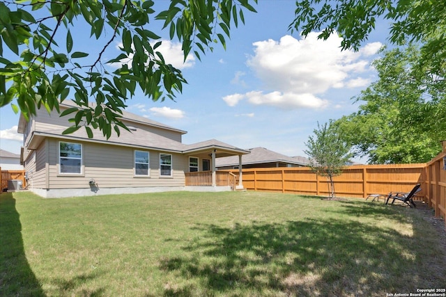 13506 Whisper Bnd, San Antonio, TX 78252 - view of yard with central AC unit and a fenced backyard