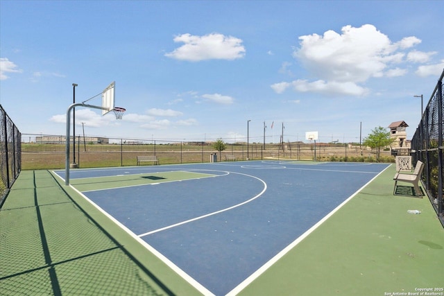13506 Whisper Bnd, San Antonio, TX 78252 - view of basketball court with community basketball court and fence