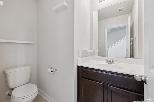 13506 Whisper Bnd, San Antonio, TX 78252 - bathroom with vanity, tile patterned flooring, visible vents, toilet, and baseboards