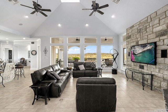 living room featuring high vaulted ceiling, visible vents, and ceiling fan