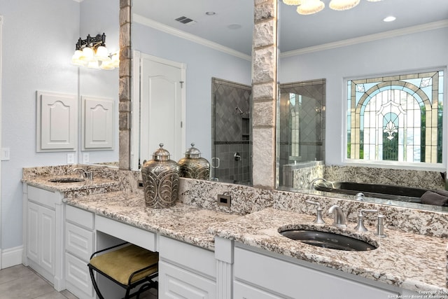 bathroom with crown molding, visible vents, a sink, a stall shower, and double vanity