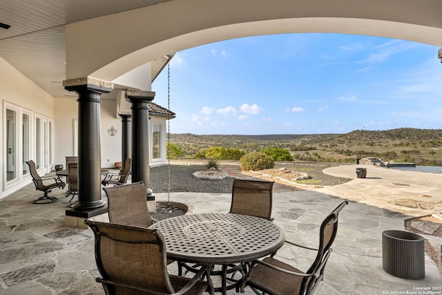 view of patio featuring outdoor dining space