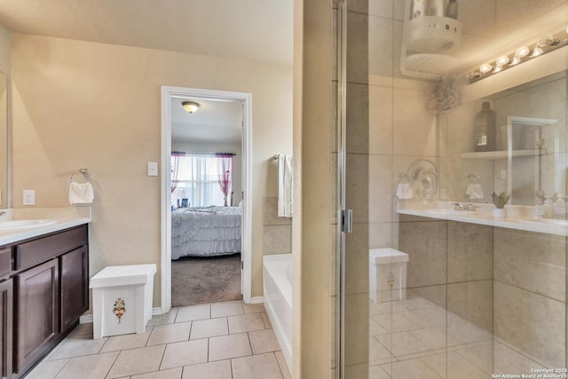 8926 Double Oak, San Antonio, TX 78254 - full bath with ensuite bathroom, a stall shower, a bath, vanity, and tile patterned floors