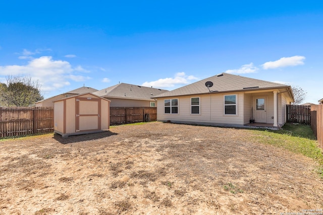 8926 Double Oak, San Antonio, TX 78254 - back of property with a shed, a fenced backyard, and an outdoor structure